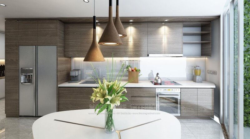 Thiết kế tủ bếp gỗ Laminate cho chung cư hiện đại. Để tạo nên không gian bếp ấn tượng, sạch sẽ và rộng rãi, gia chủ đã lựa chọn sử dụng đá ốp bên màu trắng solid surface cao cấp góp phần tạo nên một không gian bếp đẹp mắt Thiết kế và sản xuất tủ bếp đẹp