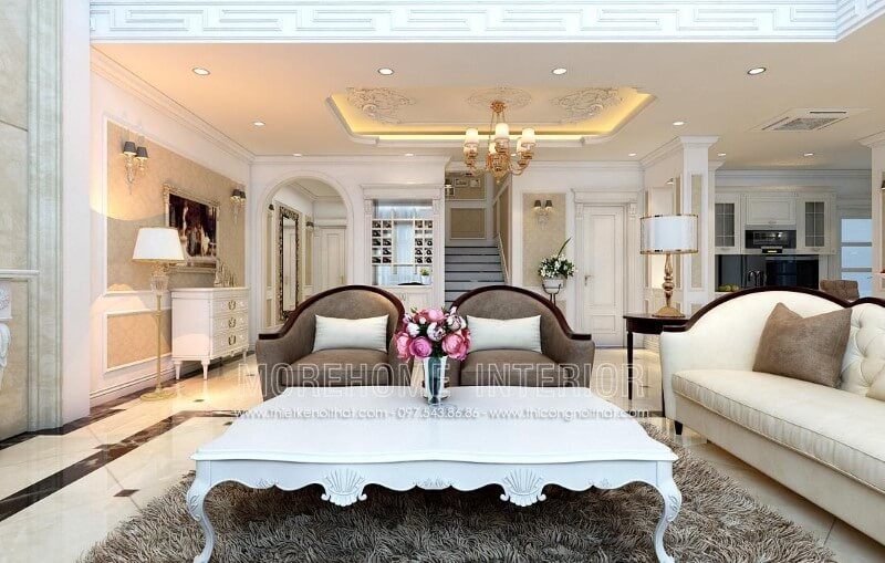 Bàn trà phong cách Tân cổ điển mang đến nét đẹp sang trọng cộng hưởng với màu sơn trắng mang lại sự năng động cho căn phòng