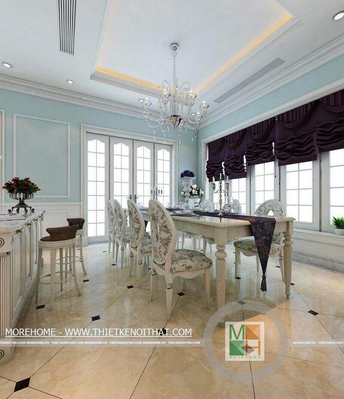 Khu vực phòng ăn được thiết kế sang trọng với tone màu trắng từ nội thất kết hợp với màu xanh-tím của tường và rèm giúp tạo nên một không gian phòng hài hòa.